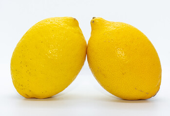 two lemons isolated on white