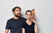 © SHOTPRIME STUDIO - man and woman wearing black t-shirts casual clothes studio family