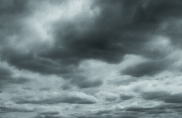 Wall Mural - gray and white fluffy clouds. cloudy sky. white and gray texture background for sad, death, hopeless