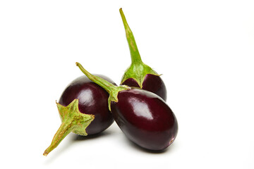 Canvas Print - Fresh eggplants close up on white background.