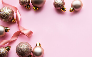 pink decorations on pastel pink background.
