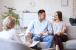 © Pixel-Shot - Psychologist working with young couple in office