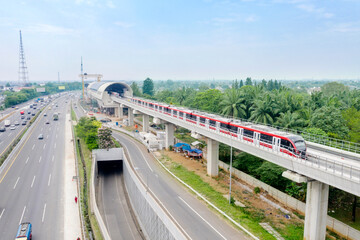 Wall Mural - Drone view of LRT train moving during trial period