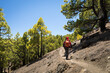 man hiking on the mountain trail on canary islands