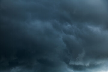 Wall Mural - Dark blue Gloomy sky with stormy clouds