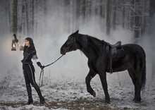 Cosplay Sorceress Yennefer From The Witcher With A Horse In The Fog