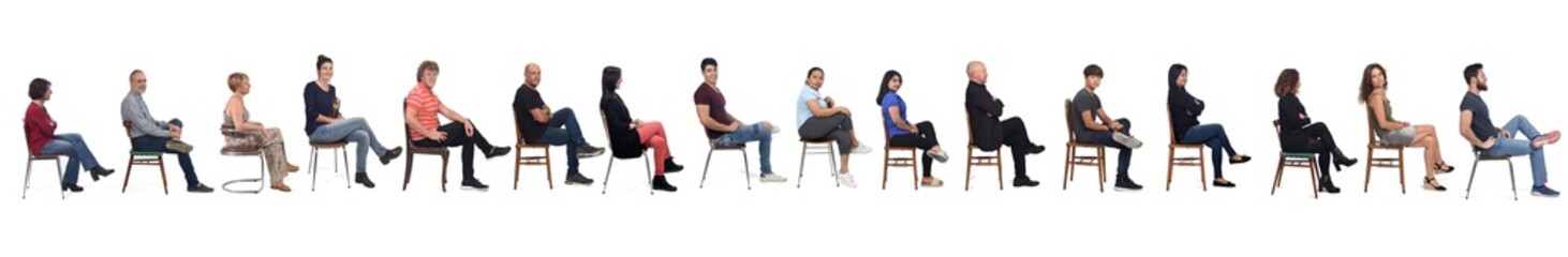 Wall Mural - Group of people sitting cross-legged on white background