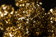 Golden Christmas ball on a black background
