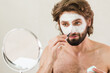 © Petryshak - Close Up Of Man Using A Facial Mask. Close up of a cute caucasian man using a natural clay facial mask.