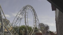 4K Rollercoaster Riding 360 Loop Upside Down In UK Theme Park