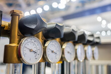 Flowmeter, Rotameter - Water Flow Regulator For Cooling System Of Injection Moulding Machine At Plant, Factory - Close Up. Measuring And Control Equipment Concept