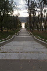 Wall Mural - Sunset in the autumn in an empty city park.