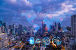 © VideoFlow - Hologram of Earth planet map on night panoramic cityscape of Bangkok, Asia. The concept of international companies. Multi Exposure.