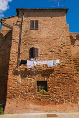 A residential building in the historic medieval village of Buonconvento, Siena Province, Tuscany, Italy
