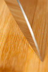 Knife on a wooden background