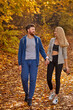 © alfa27 - portrait of caucasian lovely couple spending time together, walking. they walk through yellow woods at summer autumn day