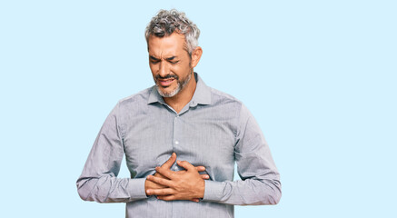 Sticker - Middle age grey-haired man wearing casual clothes with hand on stomach because indigestion, painful illness feeling unwell. ache concept.