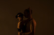 © Erika - Close-up of young romantic couple. Couple in love. Sensual. Man and woman. Studio. Photo. Lovers. Light.