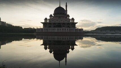 timelapse at masjid putra with red cloud change to blue. colourful change cloud during sunrise at ma