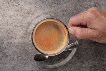 Top View of Hot Coffee and Hand.