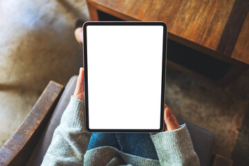 Top view mockup image of a business woman holding digital tablet with blank white desktop screen