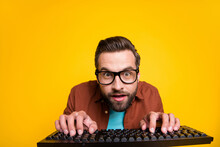 Photo Portrait Of Bearded Student Playing Video Game Crazy Geek With Keyboard In Glasses Isolated On Vibrant Yellow Color Background