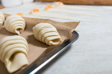 Baking croissant. Puff pastry sweets. Home baking.