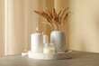 canvas print picture - Tray with scented candles and reed on gray table