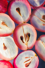 Wall Mural - Cut grapes close up, macro photography. The apple pulp is beautifully highlighted.