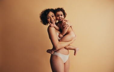 Wall Mural - Portrait of happy mother and child