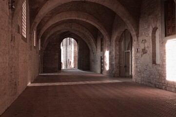  Games of light that filters through the windows inside the Palazzo Ducale in Gubbio (Umbria, Italy, Europe)