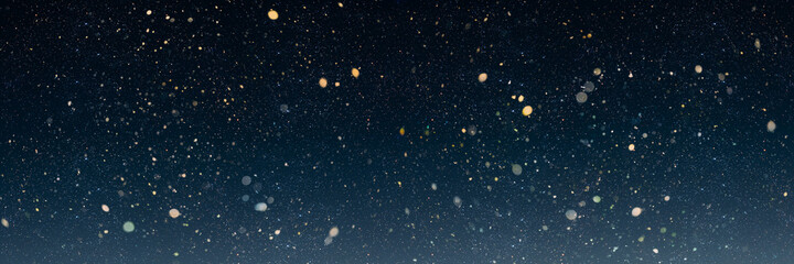 Wall Mural - a christmas night sky background with blur