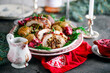 © zoryanchik - Prosciutto wrapped turkey roulade with pomergranate sauce. .style rustic.