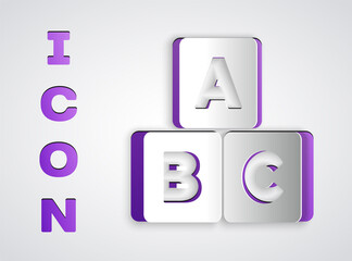 Sticker - Paper cut ABC blocks icon isolated on grey background. Alphabet cubes with letters A,B,C. Paper art style. Vector.