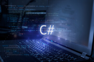 c# inscription against laptop and code background. learn c sharp programming language, computer cour