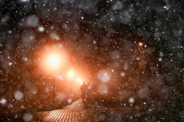 Wall Mural - abstract blurred background, landscape christmas snow city street falling snowflakes, holidays winter