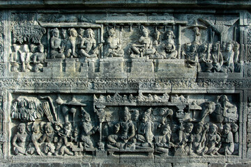 Wall Mural - Relief sculptures in Borobudur temple which tells about the life of society in ancient times.