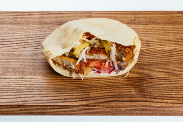 Sticker - Turkish Shawarma on a wooden Board and light background