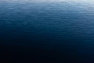 Deep blue water ripple texture vibrant monochrome river sea canal