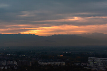 Sunset over polluted smog city environmental question conversation concept ecology nature Plovdiv, Bulgaria