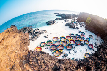 Wall Mural - Be island ( small island, Bo Bai island ) with local colorful basket boats at Ly Son island, Quang Ngai Province, Viet Nam