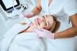 © Viacheslav Yakobchuk - Happy spa patient enjoying the cosmetic procedure