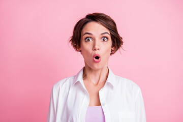 Poster - Photo portrait of shocked impressed young woman wearing fashion white outfit staring opened mouth isolated on pink pastel color background