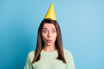 Sticker - Photo portrait of surprised girl wearing yellow cone isolated on pastel blue colored background