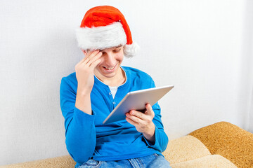 Canvas Print - Young Man with a Tablet Computer