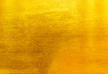 Shiny yellow leaf gold foil texture