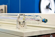 © Surasak - co2 laser tube source of laser beam of laser cutting machine or cnc engraving for industrial on table