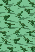 Green Dinosaurs Pattern With Shadows.