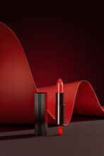 Lipstick. Creative Concept Of Red Lipstick On Black
