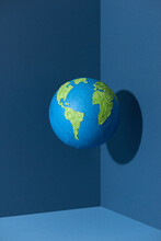 Handmade Plasticine Globe Isolated On Blue Background